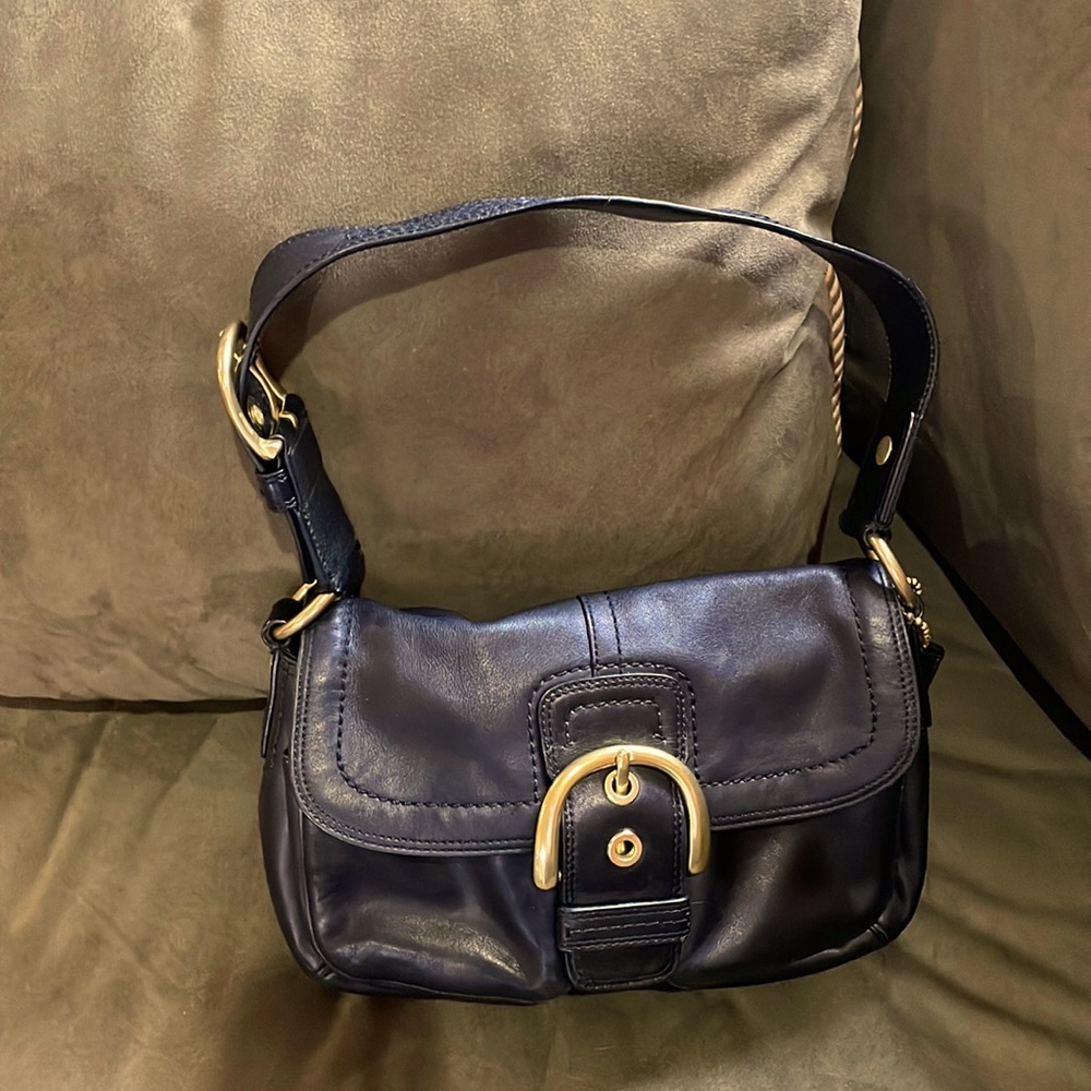 Coach black leather shoulder bag with brass hardware